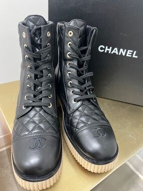 CHANEL Black Quilted Leather Lace-Up Ankle Boots with Cream Ribbed Sole
